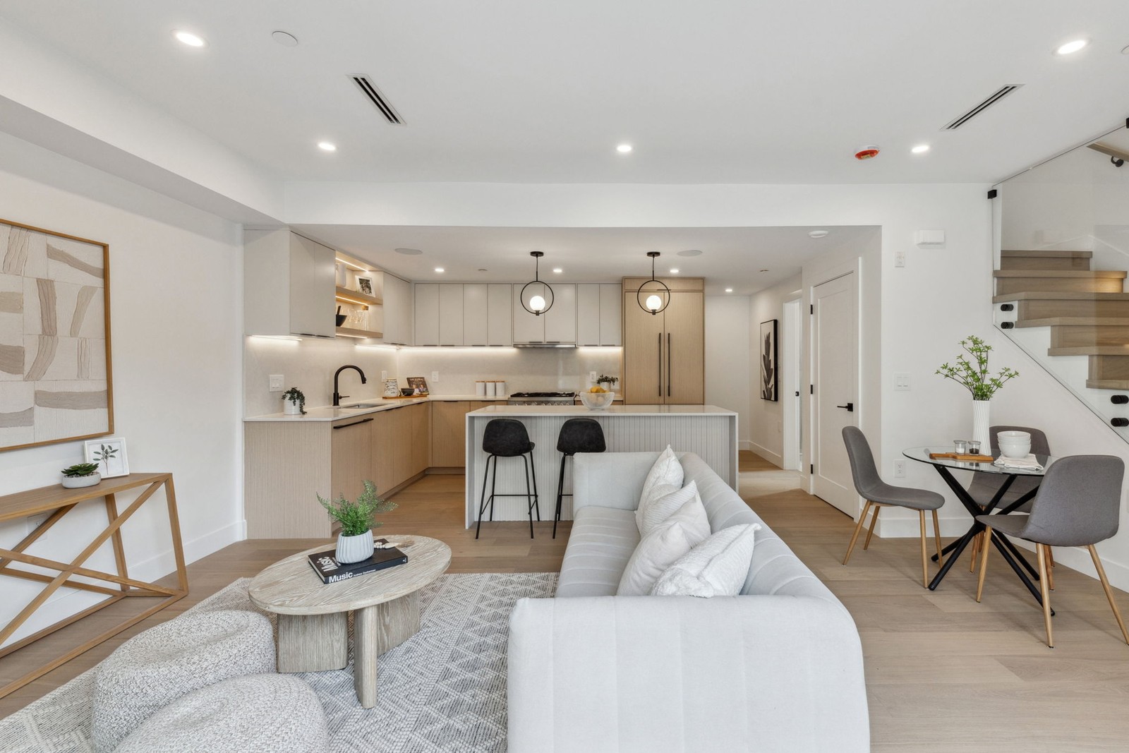 Vancouver open concept kitchen and living room with staircase